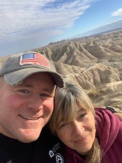 Picture of Pat and Wife with scenic view